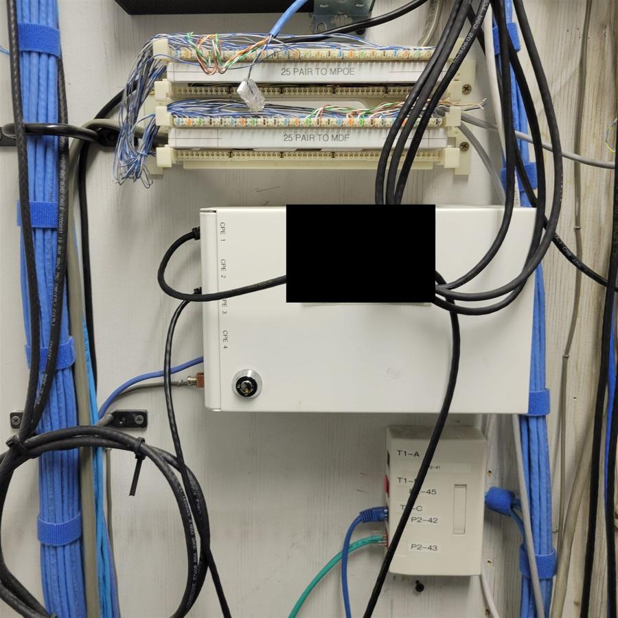 Telephony backboard: 25-pair punch-downs to MPOE and MDF