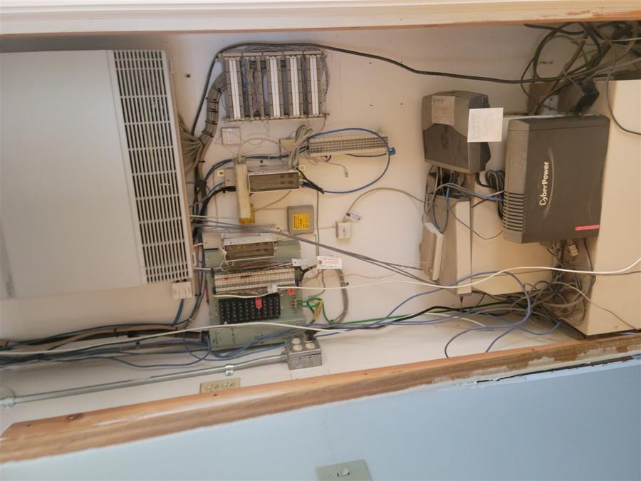 Low-voltage panel with UPS backup on a service call