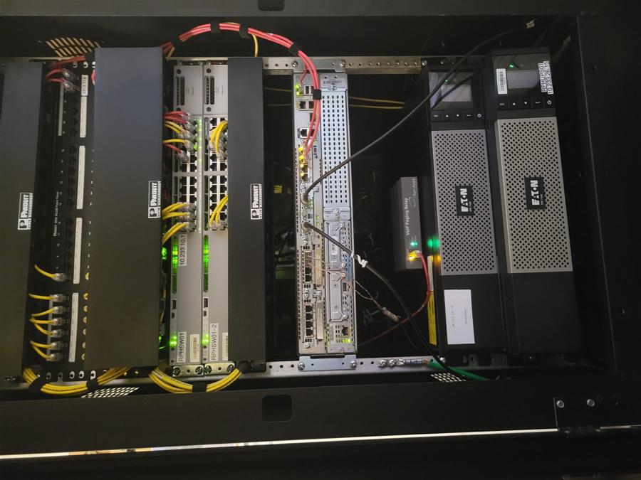 Patch panels, switching and UPS in a finished rack
